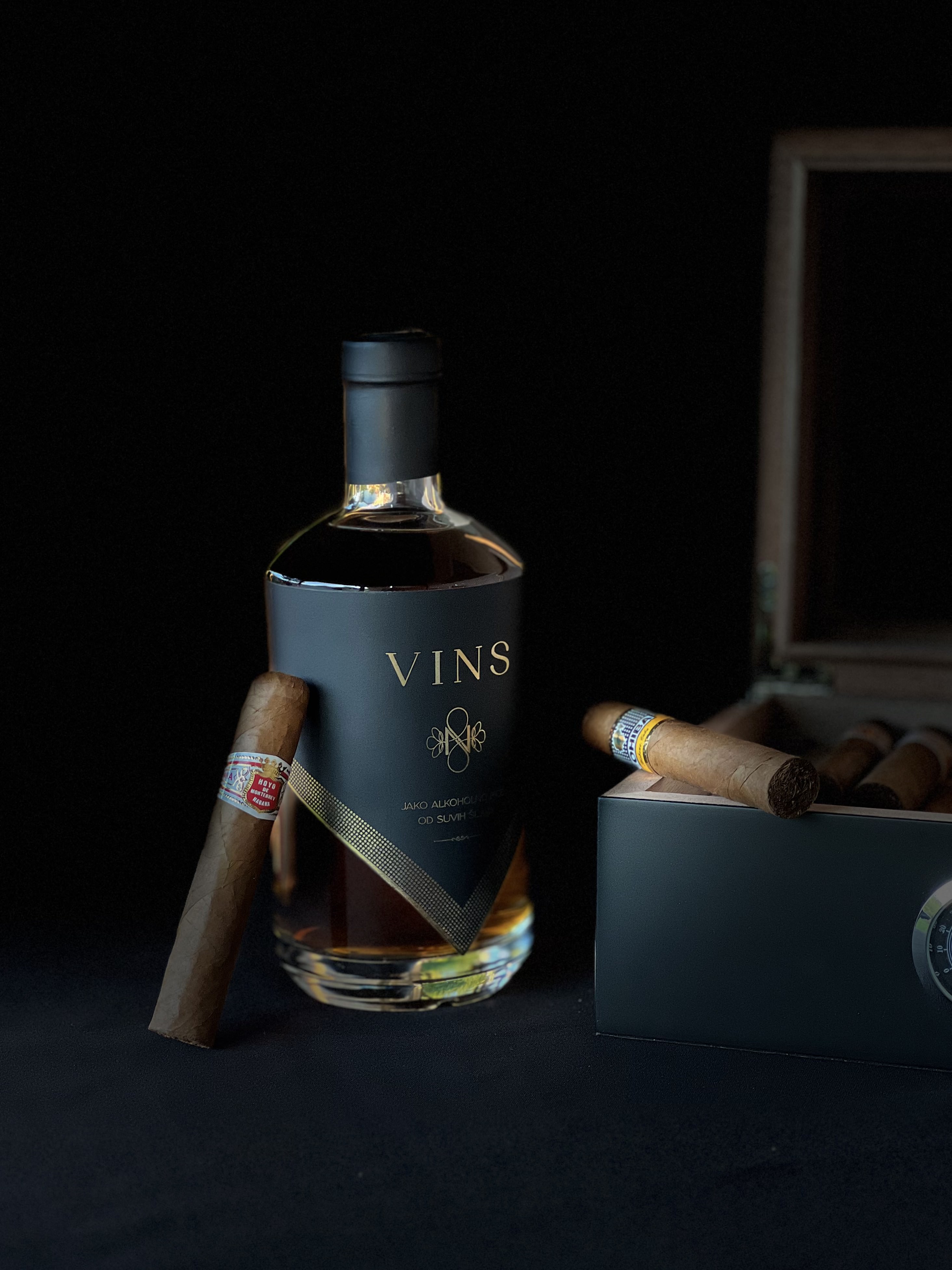 VINS premium prune brandy paired with a cigar